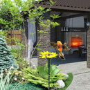 Solarer tanzender Kolibri mit Sonnenblume