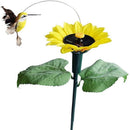 Solarer tanzender Kolibri mit Sonnenblume