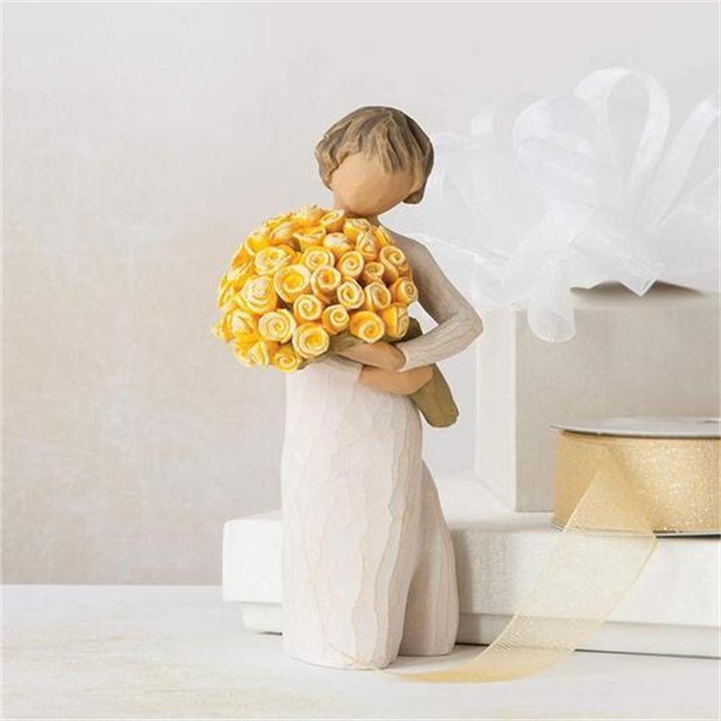 Ornamenti di figure con bouquet di fiori