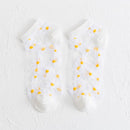 Durchscheinende Gänseblümchensocken