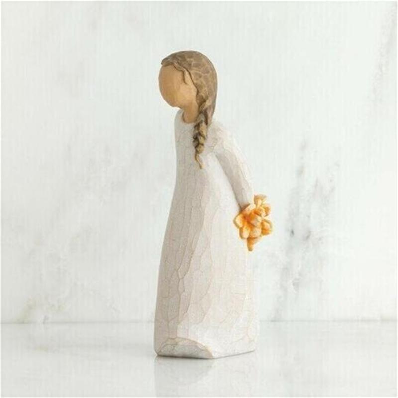 Ornamenti di figure con bouquet di fiori