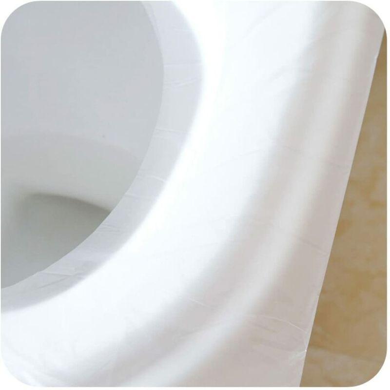 Bionedbrytbart engångsskydd i plast för toalettsits
